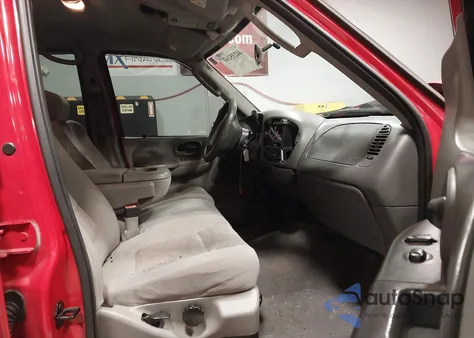 2003 Ford F-150 Lariat/Xlt z USA, uszkodzony, nr VIN 1FTRW07L33KB82002